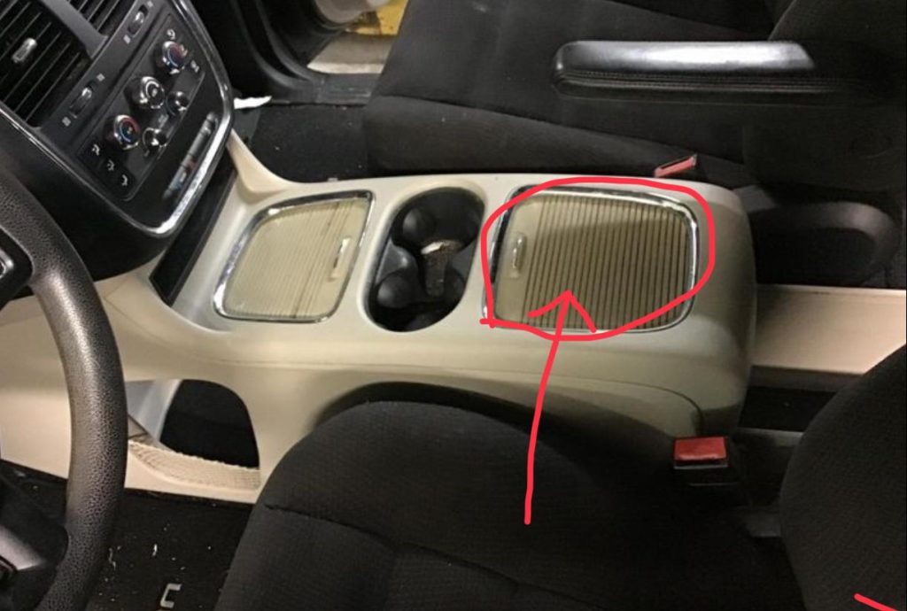 What is a Super Console in a Dodge Grand Caravan